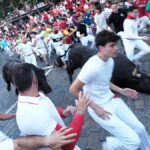 Veloz y peligroso penúltimo encierro con tres heridos corneados por los toros
